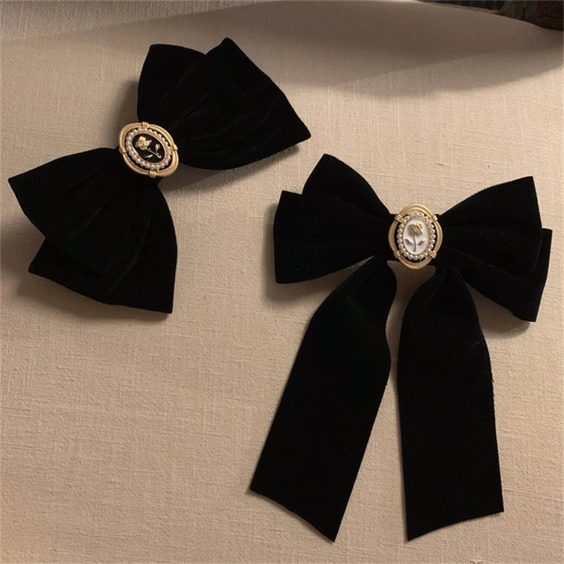 Lady Glams Black Velvet Bow Hair Clip: Retro Elegance with a Fragrant Twist